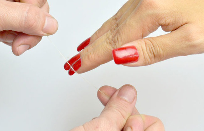 dispose of Acrylic Nails the usage of Dental Floss