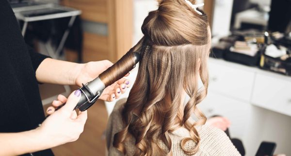 The Ultimate Curling Iron Size Guide For All Hair Lengths